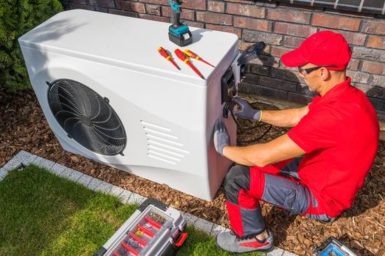 AC pro checking on hvac unit- pre-season hvac tune-up